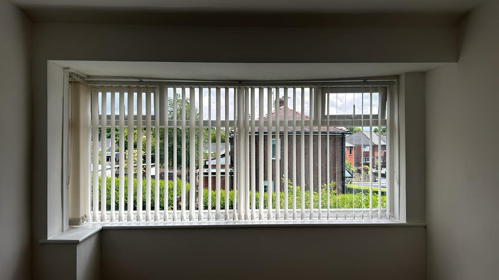Vertical blinds fitted to a patio door