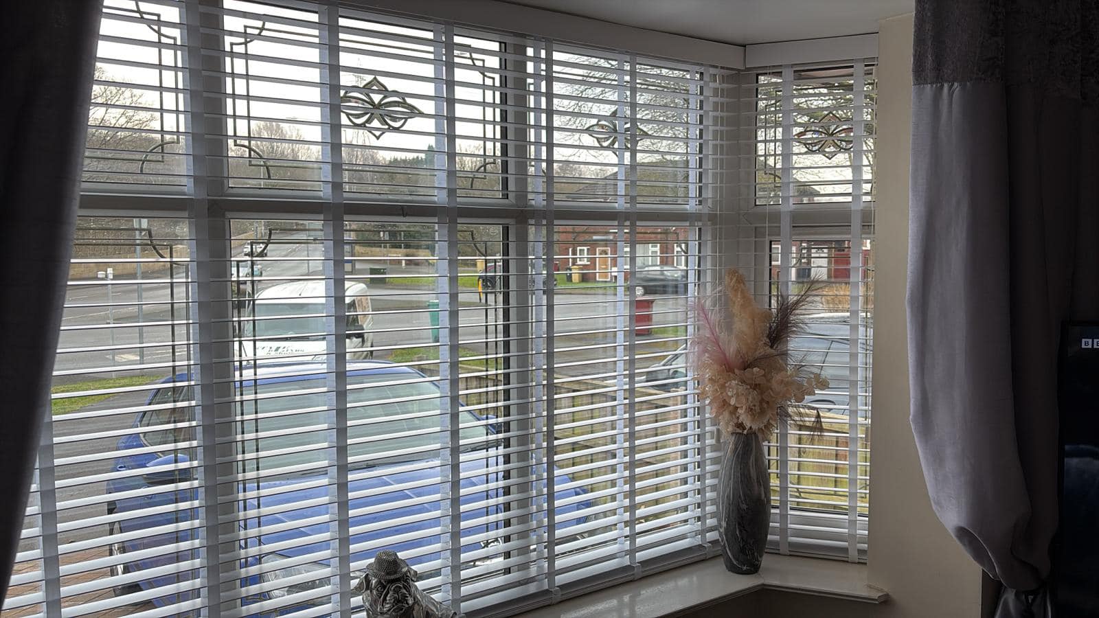 White plantation shutters fitted in a customer home